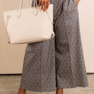 Emily McCarthy logo patterned pull on pants. NWT sz XL.